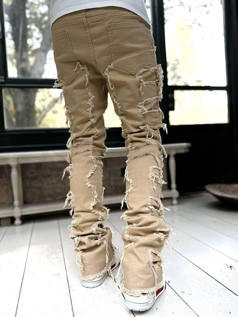 Pantalon déchiré à franges, avec patchs individuels, coupe longue ajustée, jean superposé pour hommes